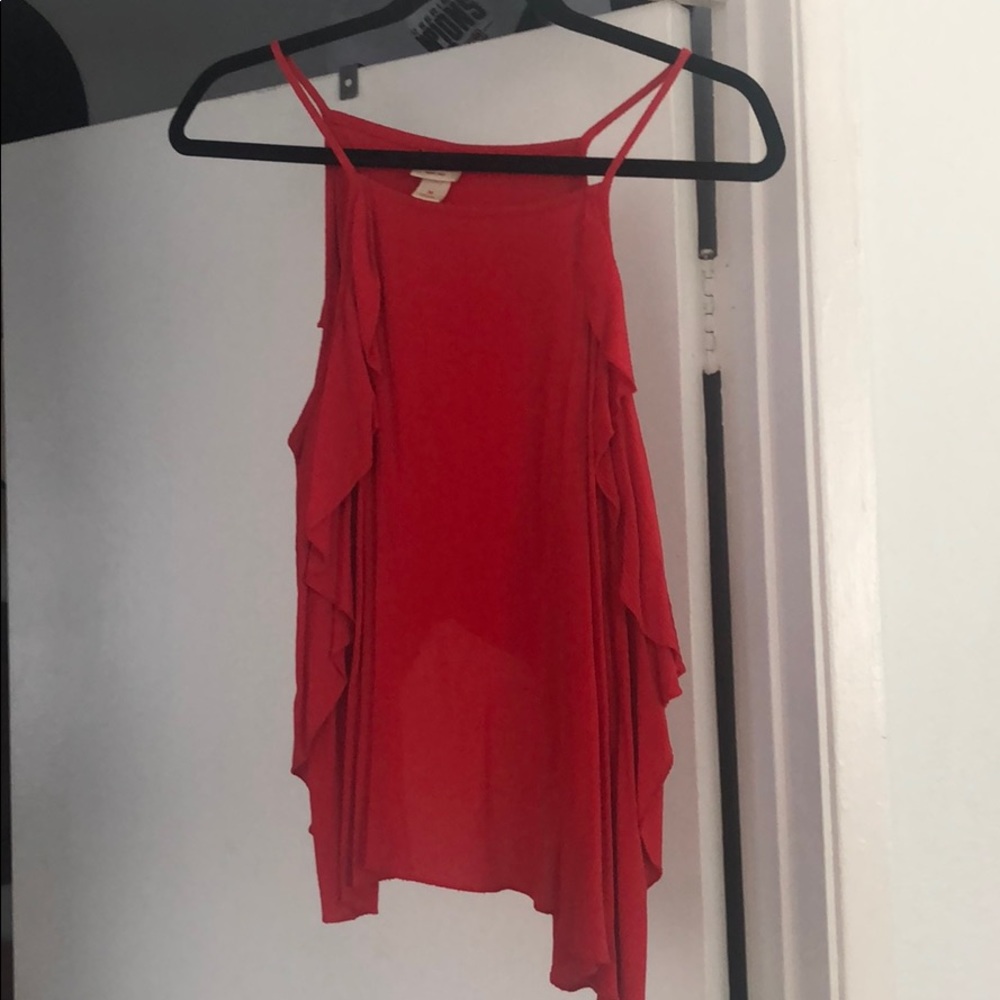 Flouncy tank with semi open back.